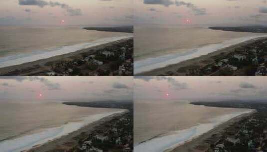 日落时分，飞机飞越墨西哥埃斯孔迪多港的普拉亚·齐卡特拉高清在线视频素材下载