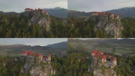 斯洛文尼亚朱利安阿尔卑斯山岩石悬崖上的历史中世纪布莱德城堡，旅游景点高清在线视频素材下载