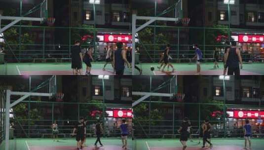 篮球场小区校区球场夜晚打篮球高清在线视频素材下载