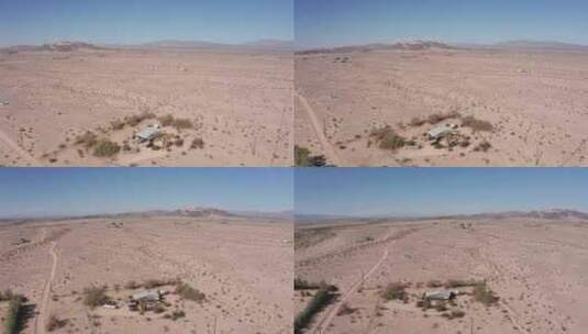 航拍贫瘠沙漠中的一所房子高清在线视频素材下载
