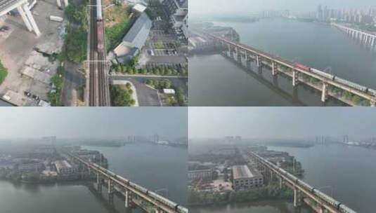 九江城市列车航拍城市火车行驶城市铁路交通高清在线视频素材下载
