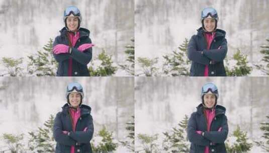 一个微笑的滑雪者在山里度假的肖像，在她身高清在线视频素材下载