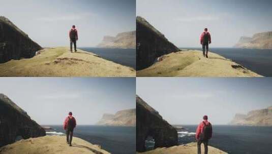 一个人走向海边山上的悬崖高清在线视频素材下载