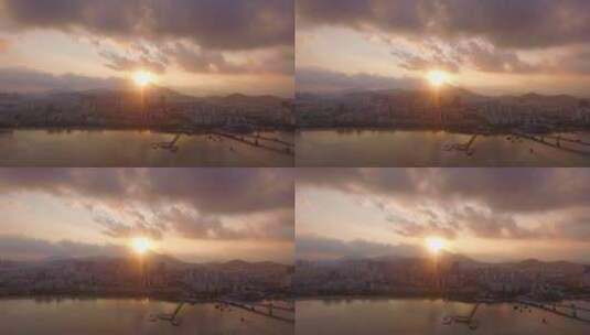 三亚湾码头城市夕阳航拍高清在线视频素材下载
