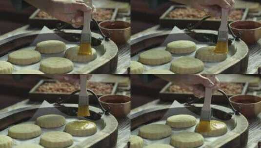 在表面定型月饼上刷蛋液高清在线视频素材下载