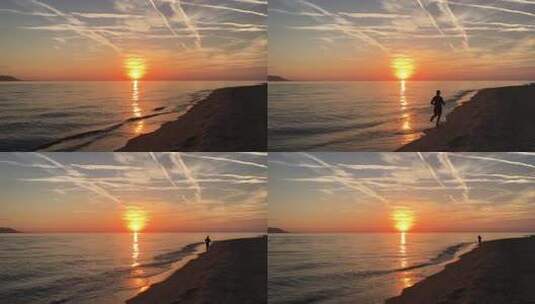 日落时在海滩上跑步的人高清在线视频素材下载