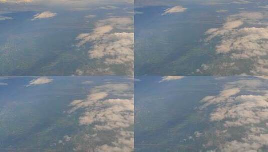 航空业飞机窗外漂浮的云景高清在线视频素材下载