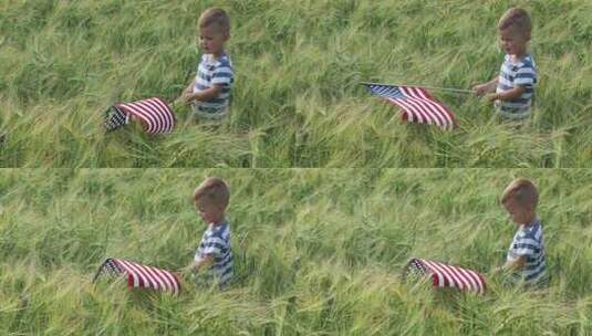 晴天独立日，男婴在麦田挥舞美国国旗高清在线视频素材下载