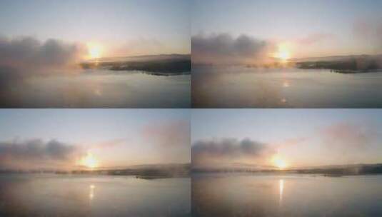 日出时分水面升起薄雾高清在线视频素材下载