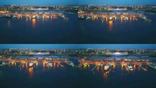 海南海口新海客运枢纽港口航拍夜晚蓝调夜景高清在线视频素材下载