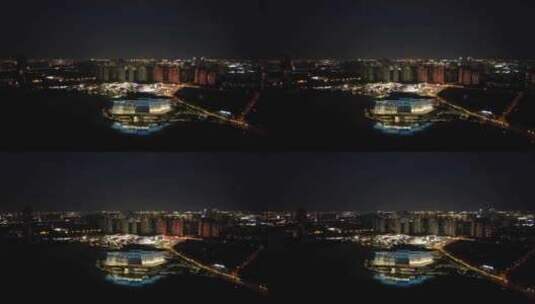 江苏无锡大剧院夜景灯光航拍高清在线视频素材下载