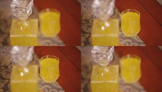 透明玻璃瓶装黄色果汁 (6)高清在线视频素材下载