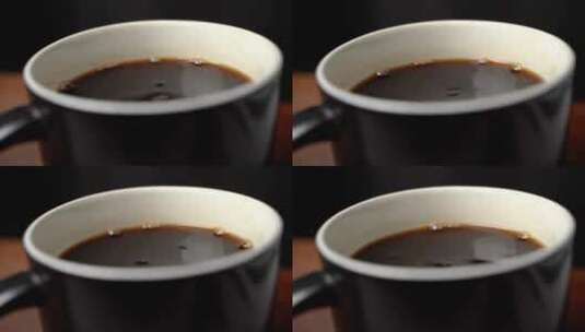 杯子里倒黑咖啡特写镜头高清在线视频素材下载