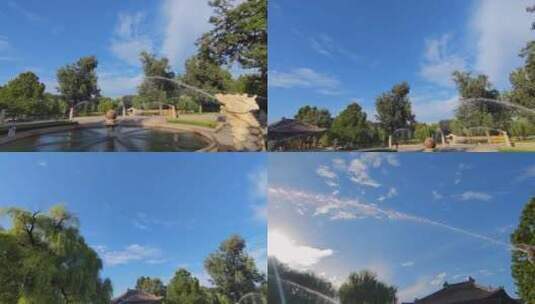 夏日美景：蓝天白云下的九龙吐珠高清在线视频素材下载