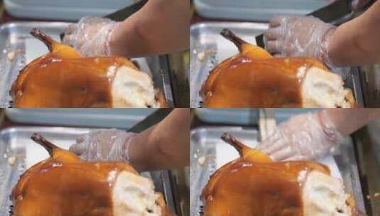 厨师在片烤鸭肉高清在线视频素材下载