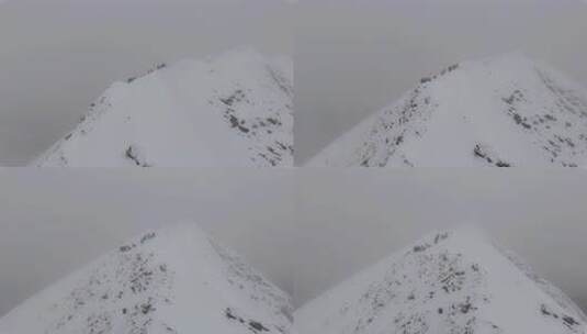 航拍登顶四川贡嘎山区贡巴峰雪山的登山者高清在线视频素材下载