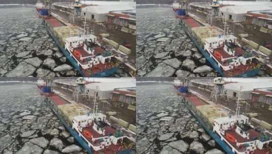 航拍停靠港口岸边的货船高清在线视频素材下载