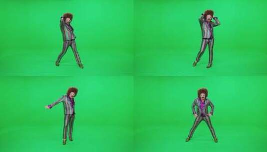 一个复古男人正在绿色背景前跳着有趣的舞蹈高清在线视频素材下载