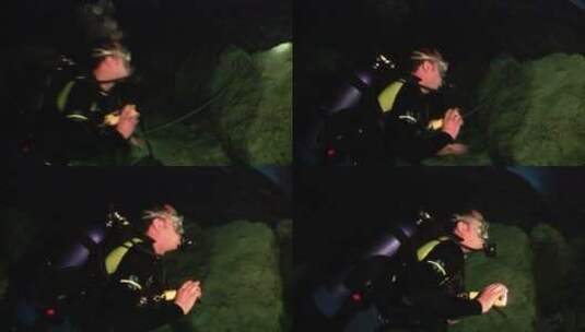 潜水员在探索水下洞穴高清在线视频素材下载