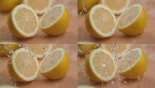 击打在柠檬上的水滴微距景观高清在线视频素材下载