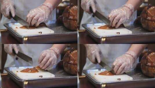 厨师正在切烤鸭肉片高清在线视频素材下载