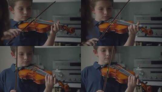 拉小提琴的男孩高清在线视频素材下载