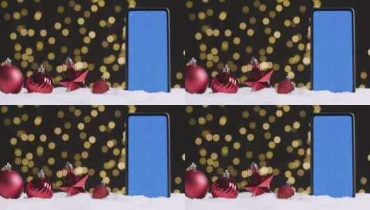 圣诞装食物旁的蓝屏手机高清在线视频素材下载