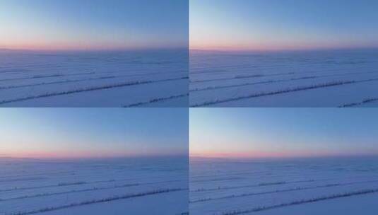 航拍4K内蒙古垦区田野雪景暮色高清在线视频素材下载