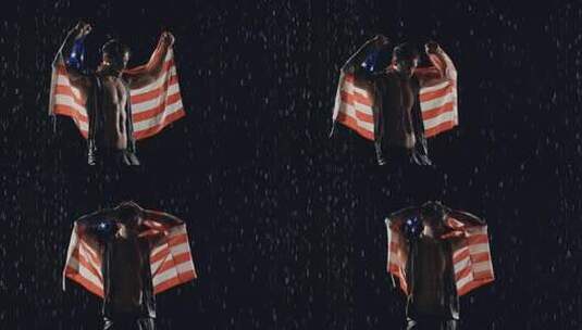 披着国旗雨中欢呼的男人高清在线视频素材下载