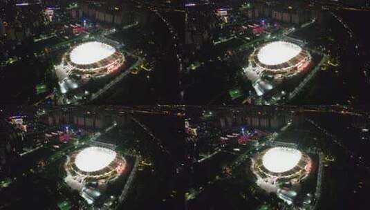 河南郑州体育馆夜景灯光航拍高清在线视频素材下载