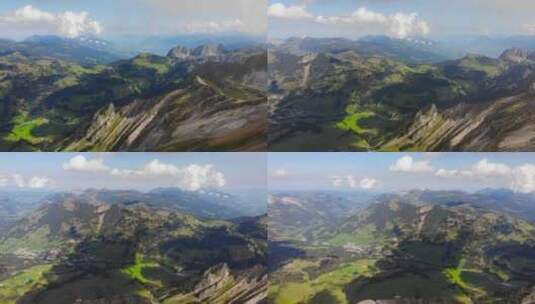 空中：瑞士阿尔卑斯山云层中的山脊和山谷高清在线视频素材下载