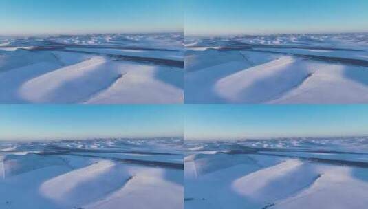 航拍严冬中的白雪皑皑的雪原高清在线视频素材下载