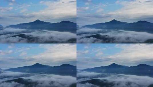 航拍云雾缭绕的山川大地高清在线视频素材下载