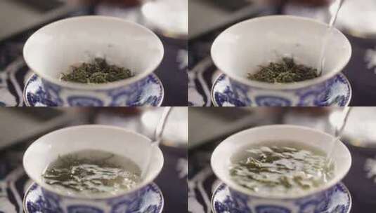 [泡茶]向茶杯中倒入开水露出部分茶叶高清在线视频素材下载