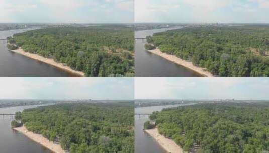 航拍河岸边的树林高清在线视频素材下载