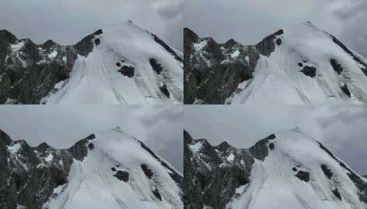 航拍四川甘孜贡嘎山卫峰乌库楚雪山风光高清在线视频素材下载