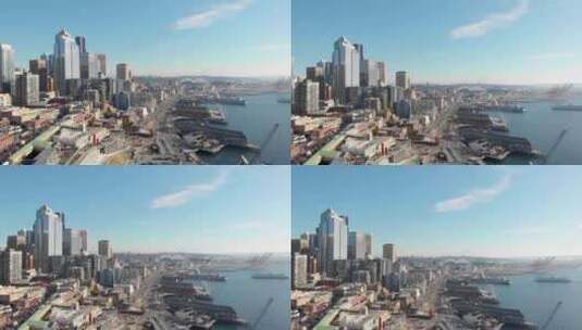 美国华盛顿州西雅图海滨的无人机鸟瞰图。阳光明媚的贝尔港码头和摩天大楼高清在线视频素材下载