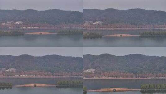 航拍晨雾笼罩下的杭州西湖断桥高清在线视频素材下载
