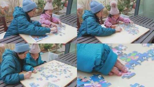 母女在别墅院子木桌子上玩拼图游戏高清在线视频素材下载
