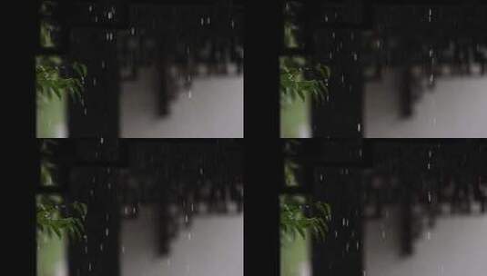 夏季雨中中式园林庭院屋檐雨滴高清在线视频素材下载
