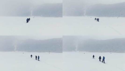 新疆阿勒泰禾木村冰雪徒步、滑雪高清在线视频素材下载