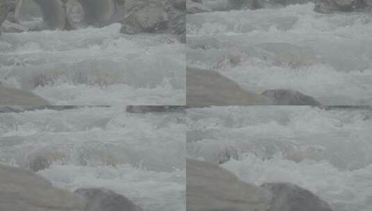 管道中流出雪山融化的溪水高清在线视频素材下载