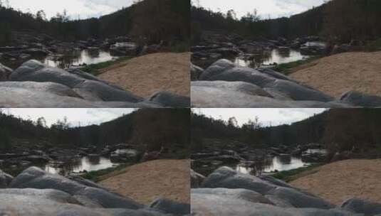 沿河的巨石高清在线视频素材下载