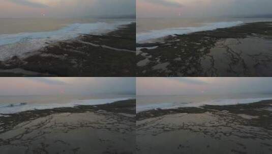 落日海浪涌向海岸景观高清在线视频素材下载