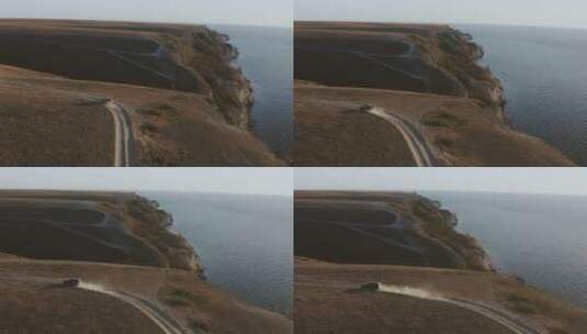 航拍车在悬崖上驶过高清在线视频素材下载