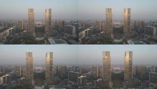 航拍郑州绿地双子塔地标建筑高清在线视频素材下载