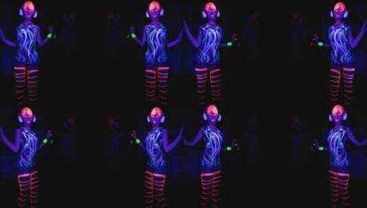 女人穿着荧光衣跳舞高清在线视频素材下载