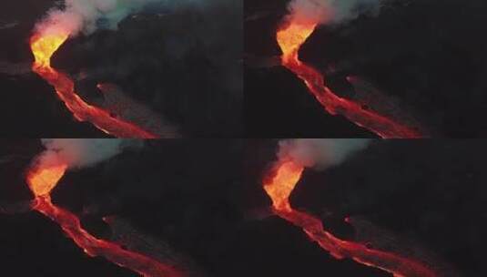 航拍夜间火山爆发巨大熔岩流高清在线视频素材下载