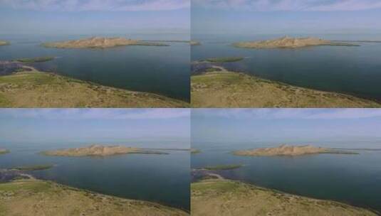 原创 新疆博湖县沙漠博斯腾湖自然风光航拍高清在线视频素材下载