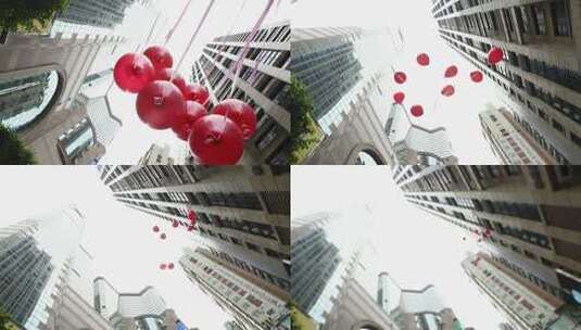 城市上空飞舞的红气球高清在线视频素材下载